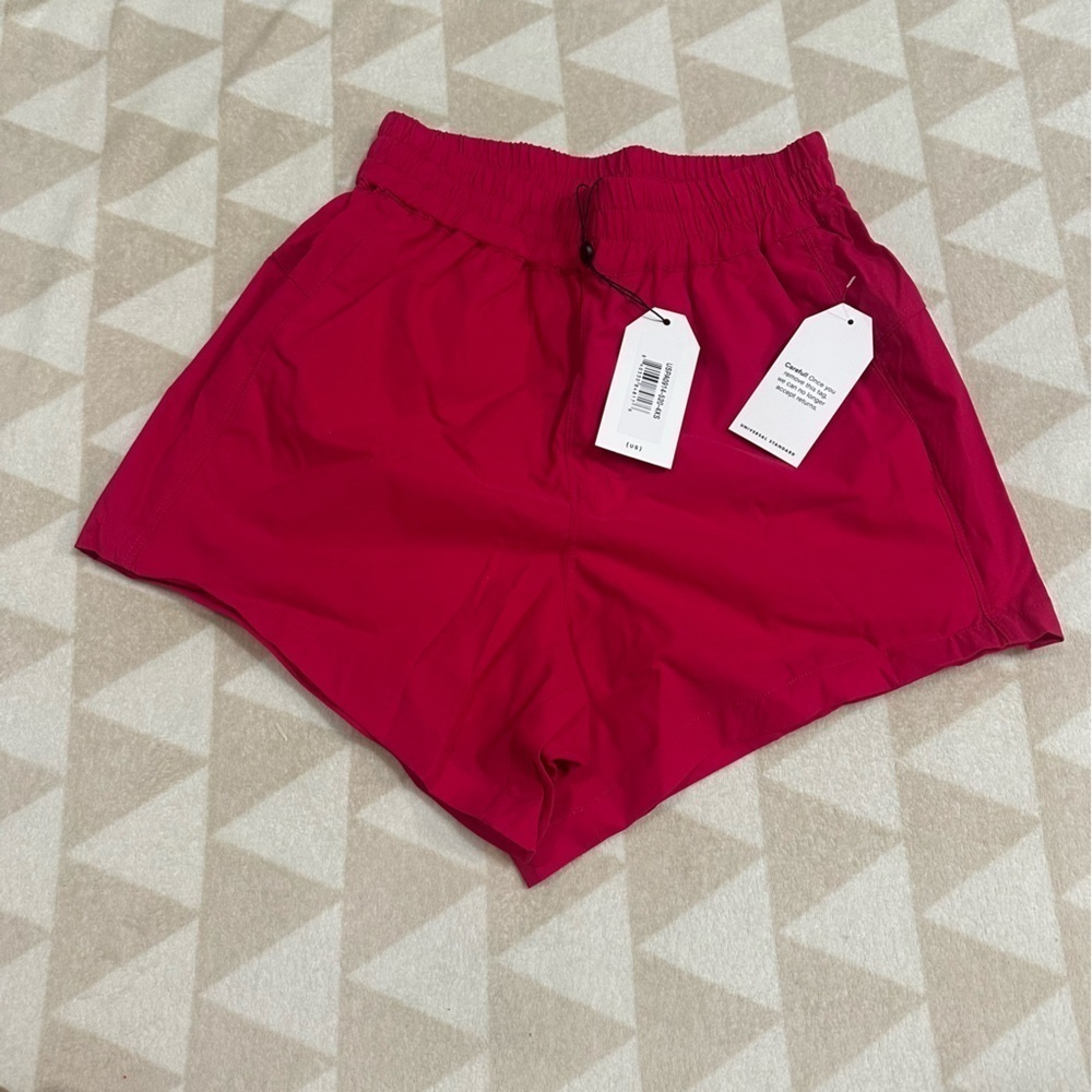 Universal standard sunny swim shorts in pink